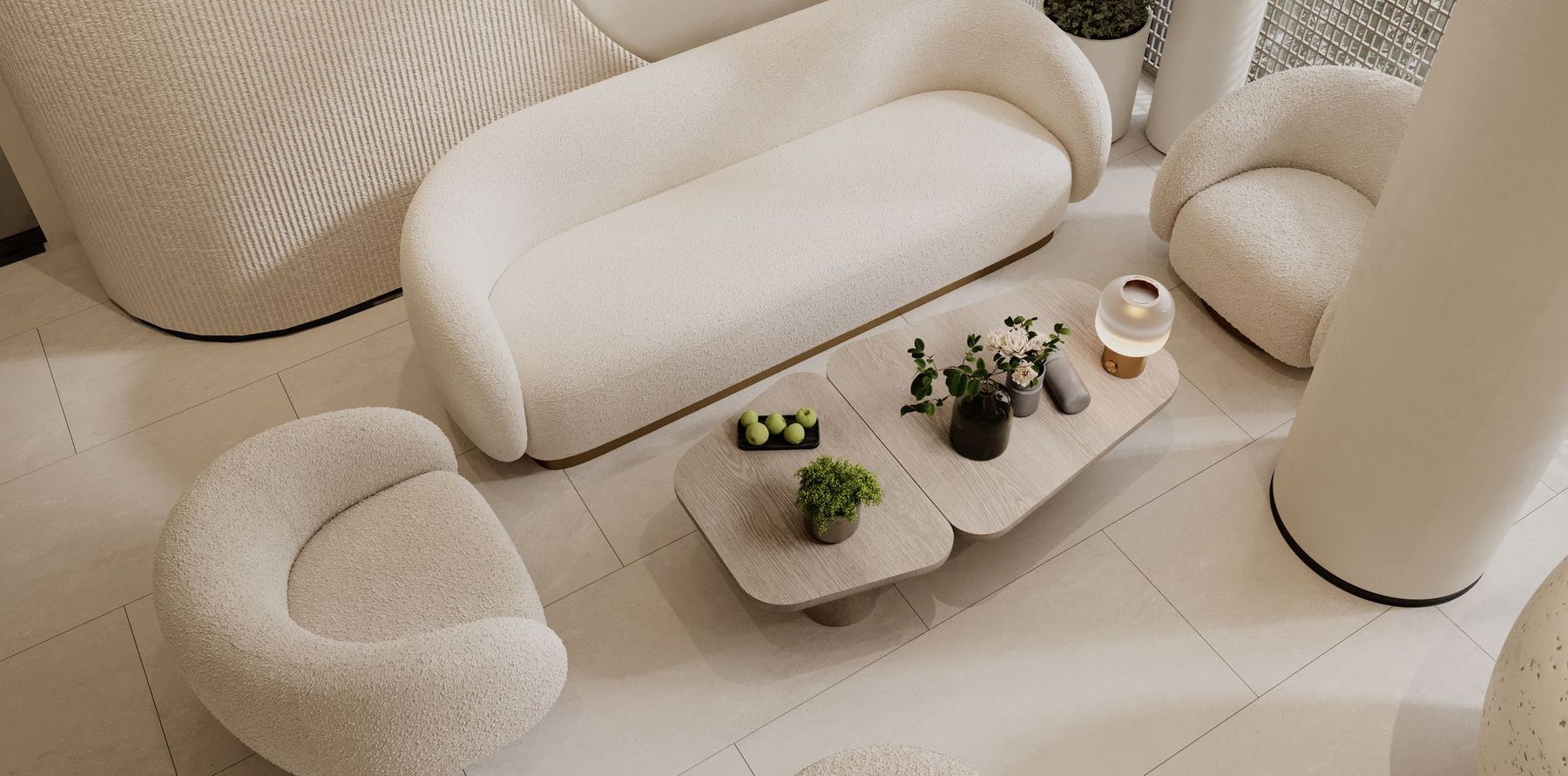 Light-filled wellness studio lounge with cream boucle armchairs around a low wooden table